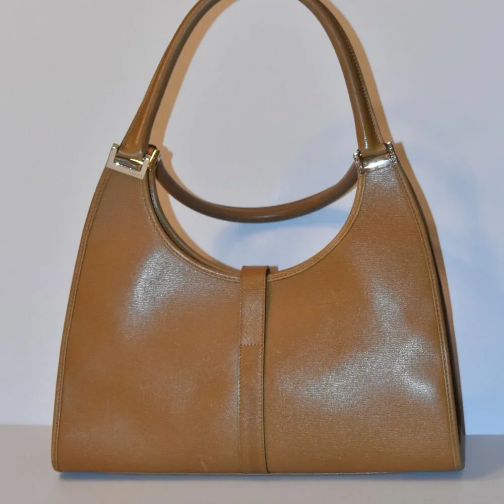 Vintage Gucci Bardo hobo bag in camel leather with the piston-lock closure